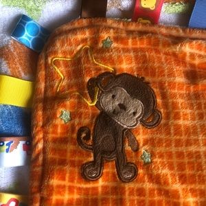Baby blanket- “Taggies” brand. Gently used